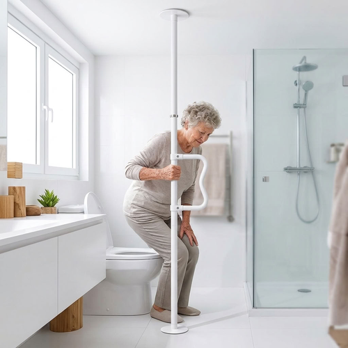 Elderly woman gripping EverSteady floor-to-ceiling transfer pole in bathroom